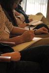 Students take notes as  David Platt encourages them to live sacrificially during the annual Faith In Practice series. - Photo by Beth Spain
