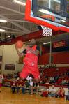 10/22/09 - Samuel Danache,  sophomore, does a slam dunk for the judged dunking contest during Bulldog Madness.