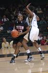 11/308/09 - Lady Bulldog Lavanda Ross tries to drive past Vanderbilt's Tiffany Clarke in an exhibition on Friday, Oct. 30.