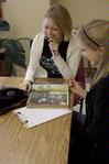 11/4/09 - Claire Elmblad, junior engineering major, and Sarah Thompson, junior elementary education major, place phone calls for the Star Center during Campus and Community Day. - Megan Bailey