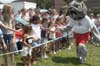 07/16/03 - Buster gets some high-fives from fans at a Jump 5 concert sponsored by Union in Franklin, Tenn.
