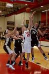 11/7/09 - Kayla Bryant, junior, goes up for the rebound against St. Francis on Nov.7. - Megan Bailey