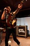 Ben Hosey, guitarist for After Edmund, performs during the homecoming concert. - Photo by Megan Bailey