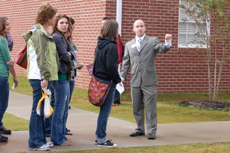Mark Mogle, enrollment counselor, gives students and their families a tour of the campus during a recent Preview Day.