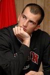 11/27/09 - Veljko Petrovic and the Bulldogs listen to Coach Niven during half time, Nov. 27.