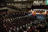 Friends and family stand and applaud the fall graduates. - Photo by Sarah Palmer