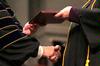 President Dockery shakes hands with each graduate as he presents them with their diploma during fall graduation. - Photo by Kristi McMurry