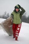 1/29/10 - Leslie Ragon, senior social work major, climbs up a hill near pleasant plains after sledding down on a cardboard box, Friday, Jan 29. - Beth Spain