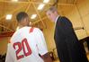 1/14/10 - Union head coach, David Niven talks with Stan McNeil. - Morris Abernathy