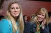 Helen Rowley (from left), freshman music major, and Katy Fraley, freshman theatre major, laugh with other students in the Bowld Commons, Sunday Feb. 7, while watching Superbowl Num. 44. - Photo by Beth Spain