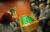 Juniors Matt Scalf, digital media studies major, James Jones, Kyle Harris, and Rhett Woody, engineering majors, play a game of Foosball in the Bowld Student Commons.  - Photo by Morris Abernathy