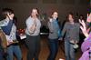 Students have fun singing along to Valentine's Day themed music at the Mugs 'N Kisses event hosted for women students by Residence Life.  - Photo by Kristi McMurry