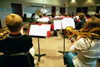 Dr. David McClune directs a Symphonic Band rehearsal in preparation for a concert.  The band performs in chapels throughout the year and offers one concert each semester.

 - Photo by Jim Veneman