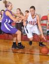 03/76/10 - Kaitlin Dudley, senior physical education and health major, drives to the basket in Game 1 of the NAIA Women's Basketball National Tournament against Southwestern Assemblies of God University. The Lady Bulldogs won 86-47. 