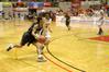 Jessica Graves, senior journalism major, plays defense in the Second Round game of the NAIA National Tournament against Southern Polytechnic State University. The Lady Bulldogs won 70-47. - Photo by Lauren Laster