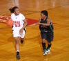 03/78/10 - Lavanda Ross, sophomore accounting major, dribbles down the court in the Second Round game of the NAIA National Tournament against Southern Polytechnic State University. The Lady Bulldogs won 70-47.