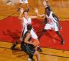 03/78/10 - Kaitlin Dudley, senior physical education and health major, and Zeinab Chan, junior history major, defend against Southern Polytechnic State University in the Second Round game of the NAIA National Tournament . The Lady Bulldogs won 70-47.