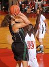 03/78/10 - Zeinab Chan, junior history major, goes up to block a shot by Southern Polytechnic State University in the Second Round game of the NAIA National Tournament. The Lady Bulldogs won 70-47.