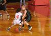 03/19/10 - Jessica Graves, senior journalism major, dribbles past her Southern Polytechnic State University opponent in the Second Round game of the NAIA National Tournament. The Lady Bulldogs won 70-47.