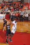 03/79/10 - Zeinab Chan, junior history major, goes up for a shot in the Quarterfinals game of the NAIA National Tournament against Oklahoma Christian University. The Lady Bulldogs won 83-55.