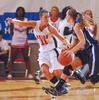 03/81/10 - Kaitlin Dudley, senior physical education and health major, runs down the court with her Oklahoma City University opponent in the Semifinals of the NAIA National Tournament. The Lady Bulldogs advanced to the finals with a win of 63-61.