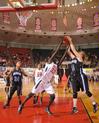 03/81/10 - Zeinab Chan, junior history major, battles for a rebound in the Semifinals of the NAIA National Tournament against Oklahoma City University. The Lady Bulldogs advanced to the championship game with a win of 63-61.