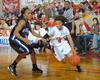 03/22/10 - Jessica Graves, senior journalism major, dribbles past her Oklahoma City University opponent in the Semifinals of the NAIA National Tournament. The Lady Bulldogs advanced to the championship game with a win of 63-61.