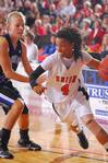 03/22/10 - Jessica Graves, senior journalism major, dribbles around her Oklahoma City University opponent in the Semifinals of the NAIA National Tournament. The Lady Bulldogs advanced to the championship game with a win of 63-61.