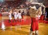 Buster the Bulldog cheers for the Lady Bulldogs as they run onto the court for the Championship game of the NAIA National Tournament. The Lady Bulldogs defeated Azusa Pacific University 73-65 to become champions. - Photo by Morris Abernathy