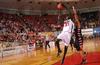 03/82/10 - Zeinab Chan, junior history major, goes up for a layup against her Azusa Pacific University opponent in the Championship game of the NAIA National Tournament. The Lady Bulldogs won 73-65.
