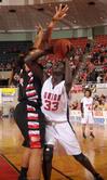 03/82/10 - Zeinab Chan, junior history major, goes up for a shot in the Championship game of the NAIA National Tournament. The Lady Bulldogs defeated Azusa Pacific University 73-65.