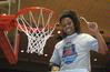 03/23/10 - Jessica Graves, senior, cuts a piece of the net after the Lady Bulldogs defeated Azusa Pacific University to win the NAIA National Tournament. 