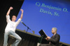 Jonathan Giles of Wartburg, Tenn. shares his enthusiasm with the crowd after answering a question moving him into the next round during SAC's game show for FOCUS 2003. - Photo by Justin Veneman