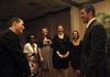 Tim Tebow laughs with Weston Wax, sophomore, after speaking at the Roy L. White Legacy Golf and Gala, April 19. - Photo by Beth Spain