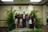 Tim Tebow, keynote speaker at the Roy L. White Legacy Golf and Gala, poses with guests after the event. - Photo by Morris Abernathy
