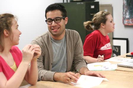 Josh Garcia, sophomore English major, fellowships with fellow students during a meeting of Untitled, a creative organization.