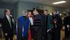 Jason Castles and Dr. Ray Van Neste stand in a receiving line after the awards service. Castles was named Staff Member of the Year, and Van Neste was named Faculty Member of the Year.  - Photo by Morris Abernathy