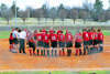 05/130/03 - The �鶹��Ƶ softball team gathers with the opponent for a postgame prayer.