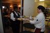 Aramark staff members work hard behind the scenes of the Etiquette Luncheon.  - Photo by Morris Abernathy