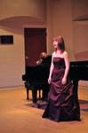 Emma Robertson, junior music education major, performs at her junior music recital. - Photo by Ryan Oetting