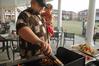 05/130/10 - Tim Vancleave and his daughter Carly prepare shish-kabobbs for the Residence Life Luau.
