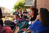 English majors gather outside Barefoots Joe to hear peers read personal work for the annual Scholarship Symposium. - Photo by Abigail Harris