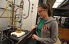 Students work on a chemistry experiment in lab. - Photo by Morris Abernathy