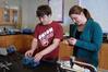 Students work on a biology experiment in lab.  - Photo by Morris Abernathy