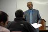 Dr. Roland Porter, associate professor of business, teaches a class.  - Photo by Morris Abernathy