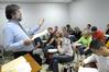 Roger Stanley, assistant professor of English, teaches a class. - Photo by Morris Abernathy