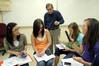 Dr. David Ward, professor of physics, helps students with some class work. - Photo by Morris Abernathy