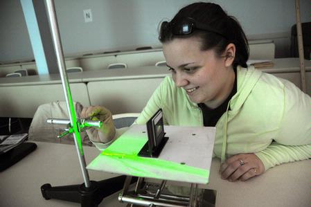 Kristina Borza, senior sports medicine major, works on a physics lab assignment.