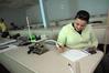 Kristina Borza, senior sports medicine major, works on a physics lab assignment. - Photo by Morris Abernathy