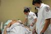 Nursing students work on simulations in Providence Hall. - Photo by Morris Abernathy